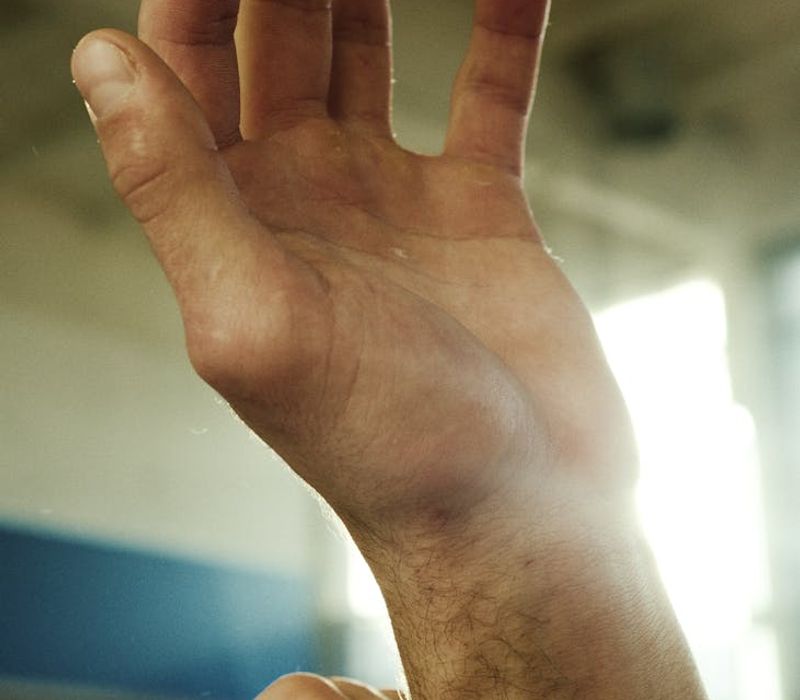 Close up of hands during a controlled strength exercise